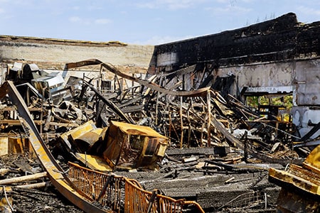 Swift Fire Damage Cleanup with Emergency Dumpster Services